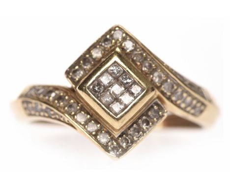 DIAMOND DRESS RINGthe square bezel with channel set princess cut diamonds, on diamond shoulders, in fourteen carat gold, size