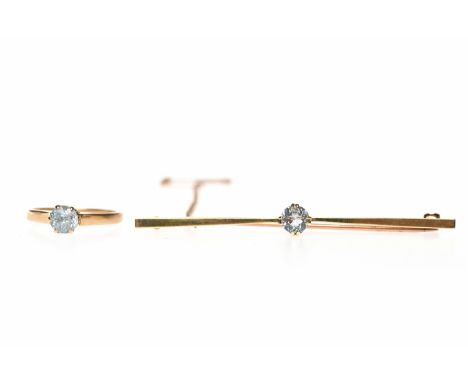 BLUE GEM SET BAR BROOCHset with a round blue gem, 57mm long, in fifteen carat gold, 3.4g; along with a zircon single stone ri