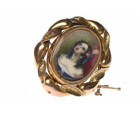 VICTORIAN PORTRAIT MOURNING BROOCHwith a central oval hand painted portrait brooch depicting a young woman in a blue dress an