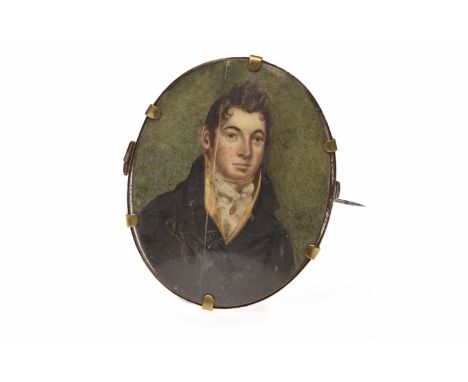 EARLY NINETEENTH CENTURY PORTRAIT MINIATURE SET BROOCHof oval form, set with a hand painted image of a gentleman, signed indi