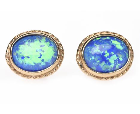 PAIR OF OPAL SIMULANT EARRINGSeach set with an oval opal stimulant 9mm long, in nine carat gold, 2.2g