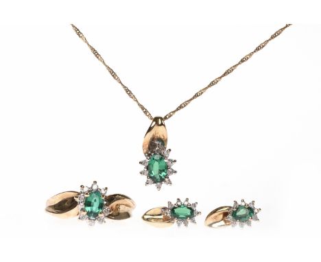 SUITE OF GREEN GEM AND DIAMOND SET JEWELLERYcomprising a cluster ring set with a central oval green gem surrounded by round d