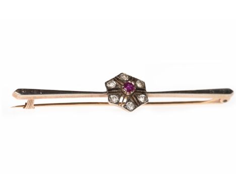 EDWARDIAN CREATED RUBY AND DIAMOND SET BAR BROOCHset with a central pierced hexagonal section set with a single central round