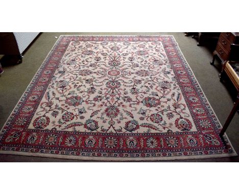 Machine Made Carpet of Oriental Design, the pale camel field of flowing vines enclosed by brick red borders of meandering vin
