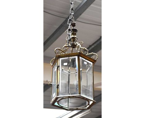 A Hexagonal Brass and Glass Panelled Hanging Lantern, (one glass missing), aprroximatley 70cm by 30cm
