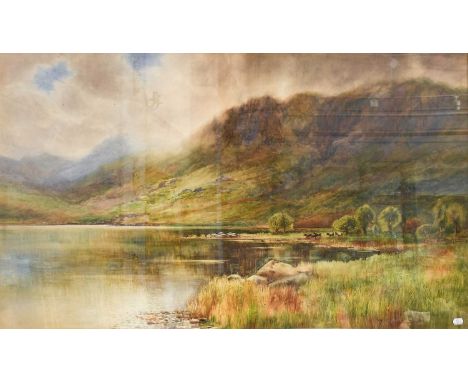 Arthur Wilkinson (c.1860-1930)  Cattle watering in a mountainous landscape Signed, watercolour, 70.5cm by 120cmProvenance: A 