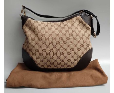 A Gucci Monogram Canvas Hobo Shoulder Bag with dark tan leather shoulder strap and mounts, gilt-tone hardware, zip fastening 