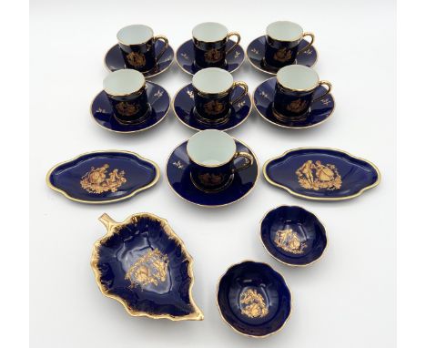 A Limoges porcelain part coffee service comprising seven coffee cans and saucers, and five dishes; All with blue glazed groun