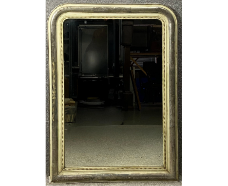 A 19th century French painted and silver gilt overmantel mirror with beadwork detailing and an engraved foliate design. H.130