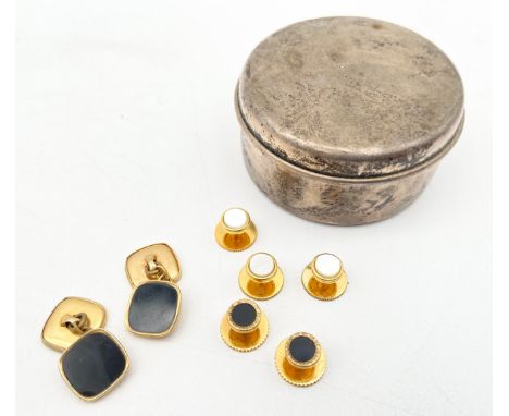 A Tiffany and Co. sterling silver box with marks, along with three sets of yellow metal cufflinks. Box dia.6cm, weight 49g gr