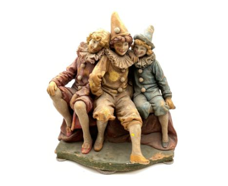 A 1930's ceramic clown figure group by Goldsheider, with an impressed maker's stamp to the back. H.50cm