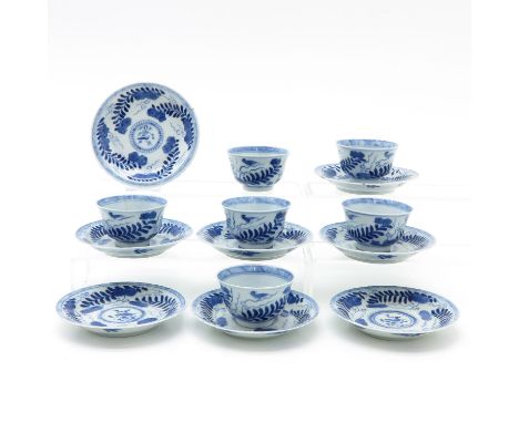 Including 6 cups and 8 saucers, blue and white floral decor with birds, Qing Dynasty, marked on bottom with double ring and s