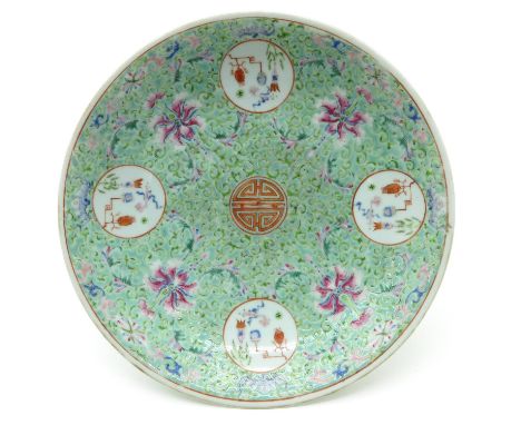 Light green ground with Famille Rose enamels, depicting flowers and Chinese symbol in center of plate, Qing Dynasty, decorate
