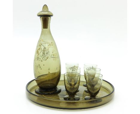 Including decanter 6 glasses and tray, each item signed Daum Nancy with cross of Lorraine, diverse decors in gold, tray is 29