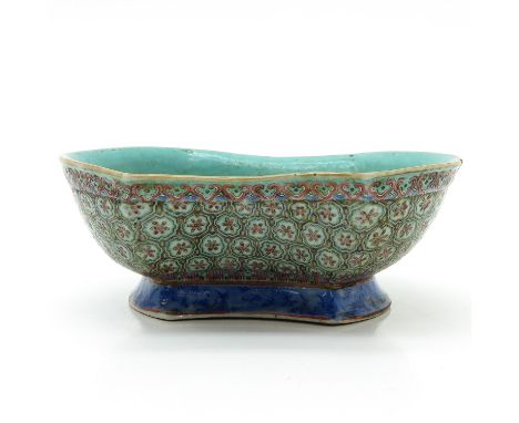 Light green ground with Famille Rose enamels, Qing Dynasty, marked on bottom with seal mark, 22 cm. long, chip on edge, 23 x 
