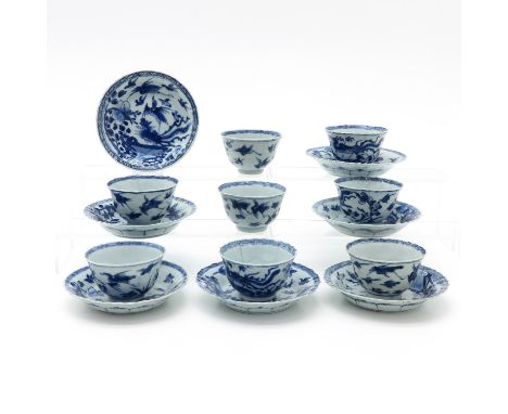 Including 8 cups and 7 saucers, blue and white decor with phoenix, saucers are 14 cm. in diameter, in diverse conditions.