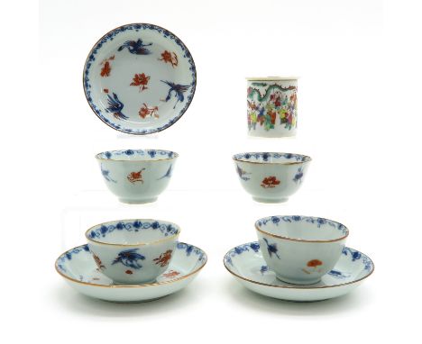 4 cups and 3 saucers, diameter 12 cm., 18th century and covered jar, with polychroom decor of playing children, chip and hair