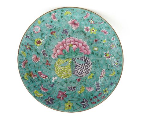 Light green ground with Famille Rose enamels depicting flowers and fruit, Qing Dynasty, marked on bottom with seal mark, 37 c