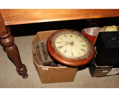 A box containing a 19th Century mahogany cased clock and various clock parts 