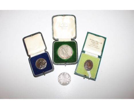 A silver Royal Navy and Army boxing medal in fitted case; together with a silver coin; and two other boxed medals