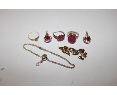 A box containing a 9ct gold bar brooch; a yellow metal ring; and various other jewellery  