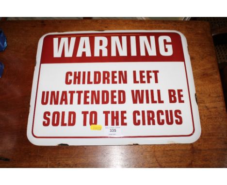 A modern humorous enamel warning sign