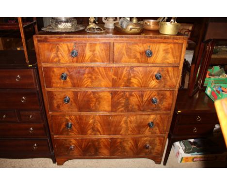 A large Victorian mahogany chest fitted two short over four long drawers (in two parts)