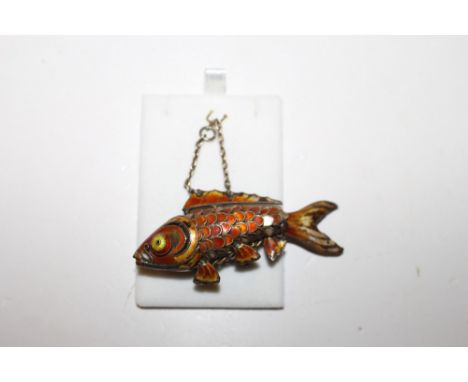 An enamel decorated articulated fish 