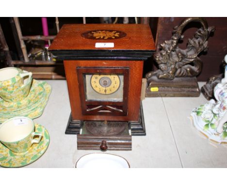 A mahogany and inlaid table clock polyphon 