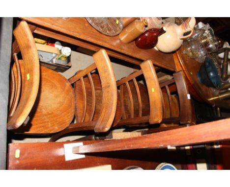 A set of six bar back kitchen chairs together with a pair of painted stick back chairs 