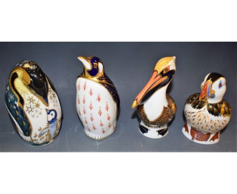 A Royal Crown Derby Paperweight, Puffin, gold stopper, boxed; another, Brown Pelican, gold stopper, boxed; others, Penguin an