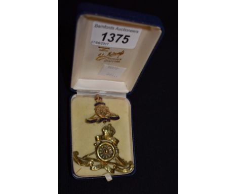A Royal Artillery enamel brooch and cap badge, boxed (2)