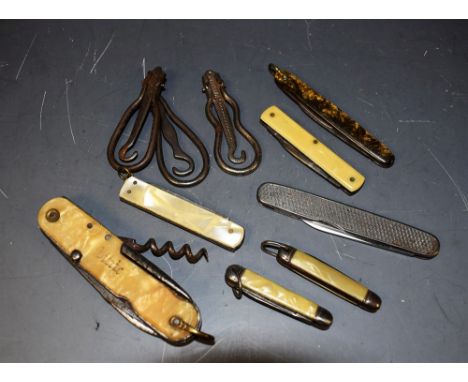A collection of seven penknives; three button hooks (10)