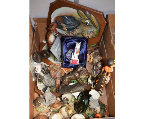 A Royal Worcester Giles Cat candle snuffer, boxed; a Bossons Fraser Art model, First Dip Otters; others similar, First Encoun