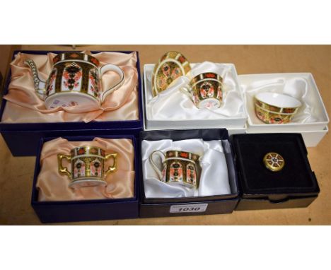 A Royal Crown Derby Imari 1128 pattern miniature teapot, first quality, boxed; others, cup and saucer, sugar bowl, cream jug,