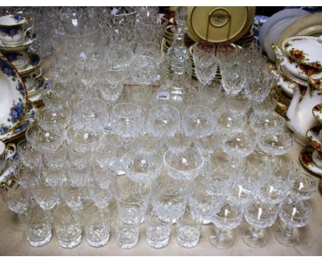 Glassware - a cut glass decanter; a suite of six cut glass wine glasses; others suites similar, tumblers, champagne coupes, e