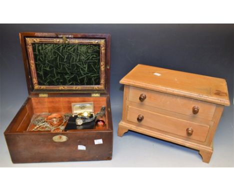 A late 19th Century mahogany jewellery box, mother of pearl cartouche, concealed drawer with contents to include paste set si