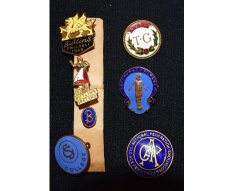 Two Butlins enamel badges, Pwllheli 1949 and 12 Guard 1951; five others (7)