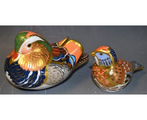 A Royal Crown Derby paperweight, Linnet, gold stopper, boxed; another, Mandarin, silver stopper, boxed (2)