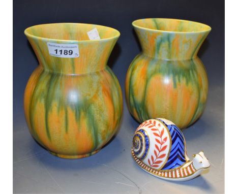 Ceramics - a pair of Bretby dribble glazed yellow & green vases, impressed marks;  a Royal Crown Derby paperweight snail, (3)