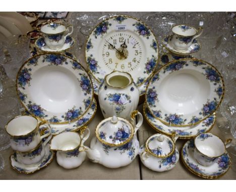 Ceramics - a Royal Albert Moonlight Rose dinner service comprising six dinner plates, eight side plates, six soup bowls, seve