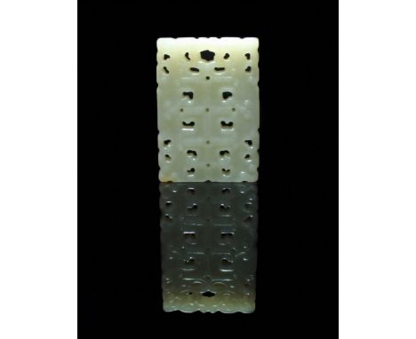 A Chinese pale green jade pendant, Qing, of rectangular form and carved with reticulated scroll forms, 4.9cm high.