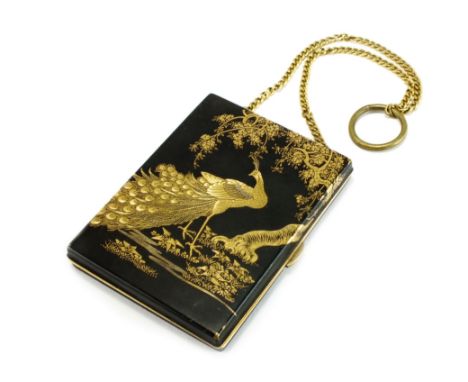 A Japanese shakudo combination compact and cigarette case, Taisho period, a gilt ring and curb chain suspending a rectangular