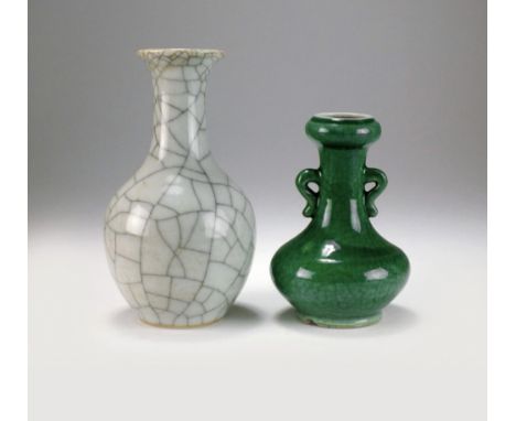 A Chinese Ge-type vase, 19th century, of bottle form, covered with a pale celadon glaze and with irregular 'iron and gold wir