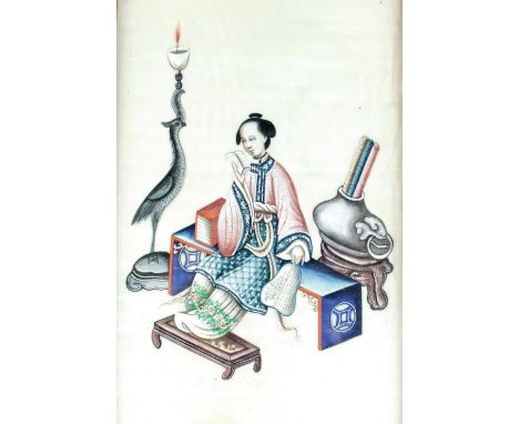 A Chinese painting on pith paper, 19th/20th century, ink and colours depicting a beauty seated reading on a bench with orname