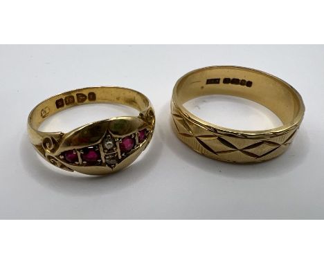 Two 18ct gold rings - comprising a patterened band ring and a ruby and diamond ring. The band ring weighs approximately 4.1 g