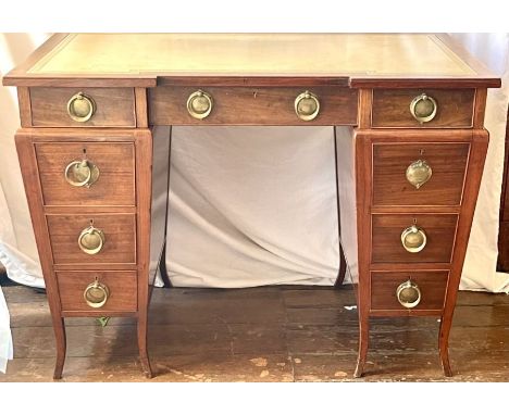 A late Victorian mahogany pedestal desk made by Graham & Banks (makers name engraved in the frieze drawer), circa 1895, inver