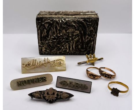 A white metal dragon and bamboo box containing a selection of Victorian and later jewellery to include a 22ct gold small sign