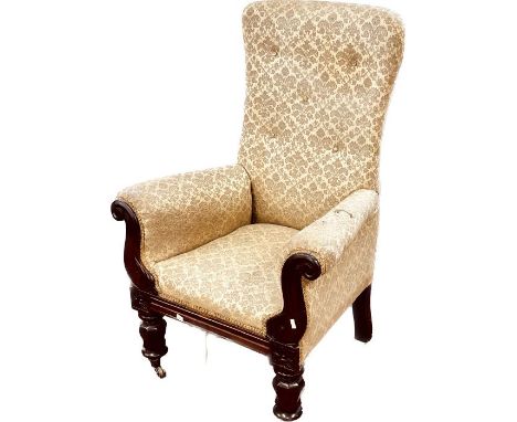 A William IV mahogany library armchair, button back, scrolling arms, later upholstery and stuffed horsehair back rest and sea