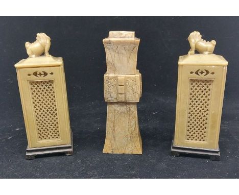 A pair of Chinese carved and pierced green soap stone boxes and covers C1910, each with Fo dog finials to the pull off covers